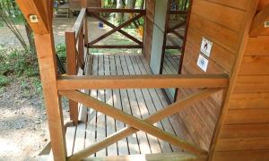 a wooden stairway leading up to a house at Camping field Kisokodo in Kiso-Fukushima