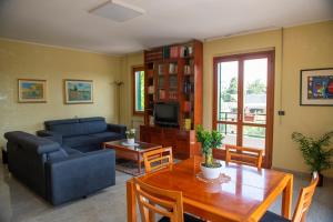 a living room with a couch and a table at I Gerani in Termoli