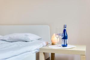 Una cama o camas en una habitación de Elite Apartments Korzenna City Center