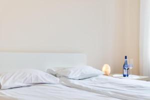 Una cama o camas en una habitación de Elite Apartments Korzenna City Center