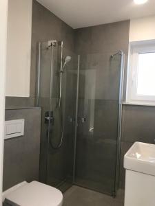 Ένα μπάνιο στο Ferienwohnung Eidem
