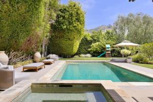 Πισίνα στο ή κοντά στο Malibu Reserve by Stay Awhile Villas