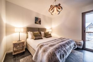 Postel nebo postele na pokoji v ubytování Apartment Rivulet, Châtel- by EMERALD STAY