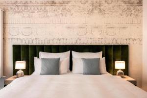 Wellnesshotel Wittelsbach客房内的一张或多张床位