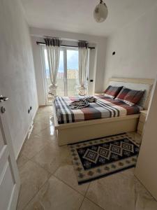 Postel nebo postele na pokoji v ubytování Arditi Guest House