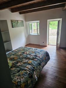 Postel nebo postele na pokoji v ubytování Le Cabistrou