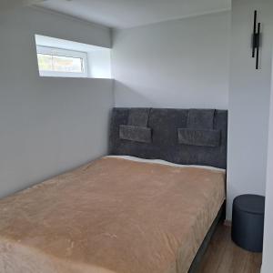 Voodi või voodid majutusasutuse Amarulluse guesthouse toas