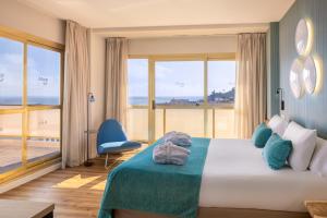 Posteľ alebo postele v izbe v ubytovaní htop Amaika & SPA 4Sup - Adults Only #htopBliss