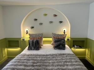 Cama o camas de una habitación en Hotel du Dragon