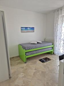 Postel nebo postele na pokoji v ubytování DDN House