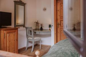 TV a/nebo společenská místnost v ubytování Hotel Glücksschmiede - Hinterglemm