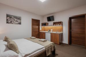 Postel nebo postele na pokoji v ubytování Residence Malva