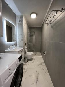 Phòng tắm tại Lago Mare Apartment