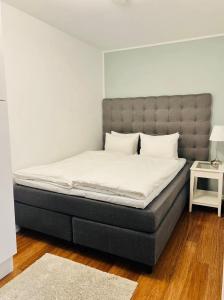 Postel nebo postele na pokoji v ubytování Continental Apartment Hotel Sollentuna