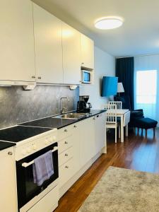 Kuchyň nebo kuchyňský kout v ubytování Continental Apartment Hotel Sollentuna