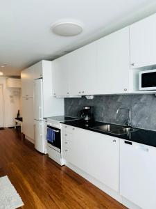 Kuchyň nebo kuchyňský kout v ubytování Continental Apartment Hotel Sollentuna