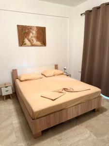 Postel nebo postele na pokoji v ubytování Villa Spartandom