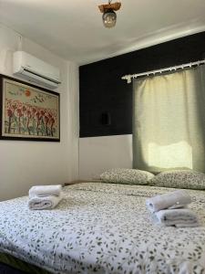 Postel nebo postele na pokoji v ubytování Kılavuz otel
