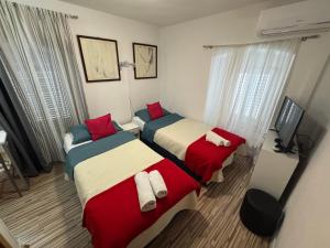 Postel nebo postele na pokoji v ubytování Damira Rooms