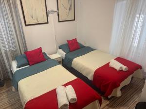 Postel nebo postele na pokoji v ubytování Damira Rooms