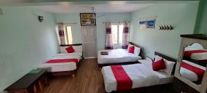 Letto o letti in una camera di Hotel Elite Pokhara