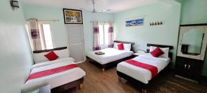Letto o letti in una camera di Hotel Elite Pokhara