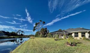 a house on the side of a river at Villa with swimming pool & spa in quiet area in Rotonda West