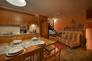 Kuchyň nebo kuchyňský kout v ubytování Baita Mirtillo + 31 fotografií