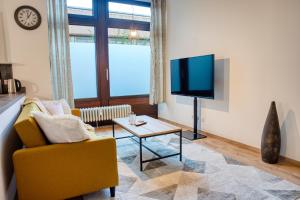TV a/nebo společenská místnost v ubytování TheStationNest