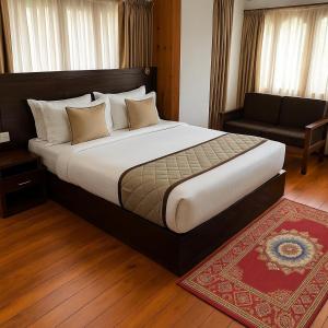 Postel nebo postele na pokoji v ubytování Norbu Healing Hotel