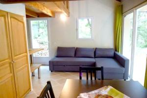 Χώρος καθιστικού στο Maison confortable à Velleron de 50 m² avec piscine