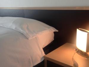 Letto o letti in una camera di B&B Daniel