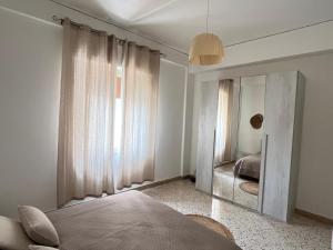 Katil atau katil-katil dalam bilik di Dolce Sicily a 1km dal centro