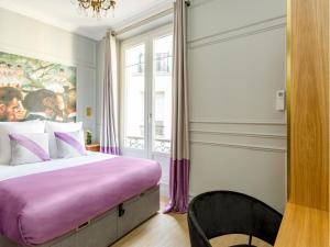 Posteľ alebo postele v izbe v ubytovaní Merveil - Luxury Suite - Louvre - Opera I
