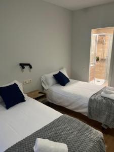 Postel nebo postele na pokoji v ubytování Can Xaran Hotel