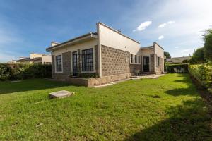 Zahrada ubytování Lumie Villa #33, Swara Ranch, Nanyuki