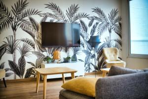 Posezení v ubytování Chambre 25m2, SDB PV, 3 pers, Centre, 160m2, WIFI