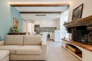 Η κουζίνα ή μικρή κουζίνα στο GuestHost - Mare Monti Apartments 1-5-6-8