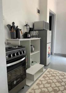 Kuchyň nebo kuchyňský kout v ubytování Optimal Home in Nyeri
