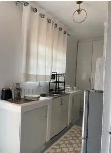 Kuchyň nebo kuchyňský kout v ubytování Optimal Home in Nyeri + 15 fotografií