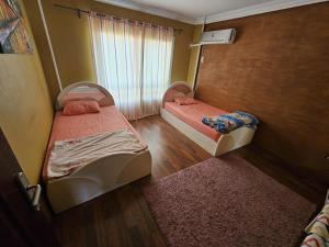 Ένα ή περισσότερα κρεβάτια σε δωμάτιο στο Elite stay at Madinaty