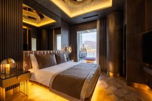 Postel nebo postele na pokoji v ubytování Merit Starlit Hotel & Residences