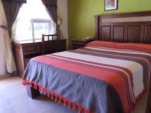 Postel nebo postele na pokoji v ubytování Hotel Ecológico Temazcal