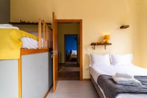 Letto o letti in una camera di GuestReady – Rustic Charm in Peaceful Madeira