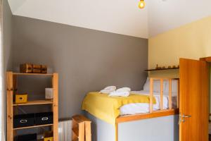 Letto o letti in una camera di GuestReady – Rustic Charm in Peaceful Madeira