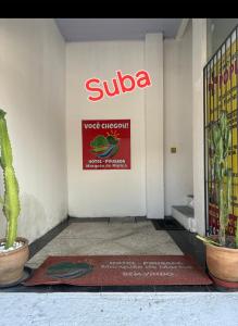 a subaya sign on the wall of a building at Hotel Marquês de Maricá in Maricá