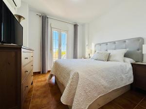 Posteľ alebo postele v izbe v ubytovaní Marina Canela Home