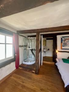 Postel nebo postele na pokoji v ubytování Hotel Pemü