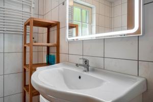 Koupelna v ubytování Ferienwohnung Ostseezeit + 23 fotografií
