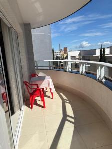En balkon eller terrasse på Apartamento Mobiliado Completo + 23 billeder